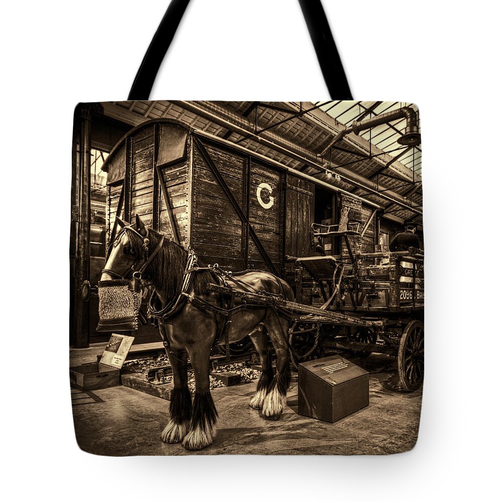 Clare Bambers Tote Bag featuring the photograph Horse and Cart Loading Train by Clare Bambers