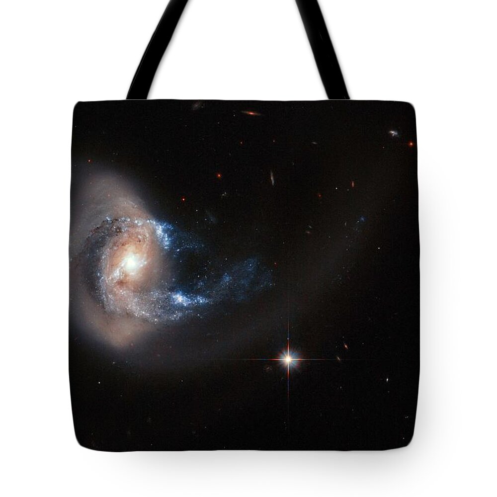 Nebula Tote Bag featuring the painting Hubble image of NGC 7714 by Celestial Images