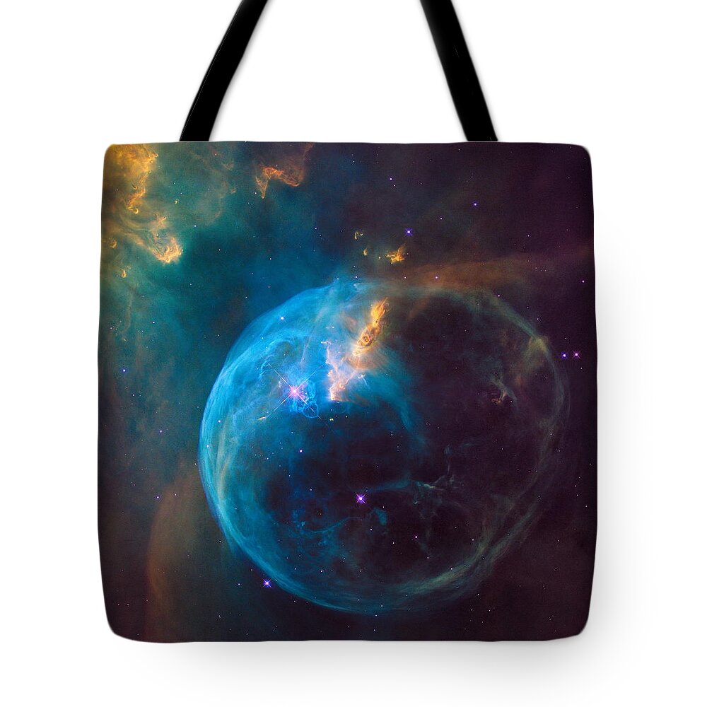 Hubble Tote Bag featuring the photograph Hubble Sees a Star 'Inflating' a Giant Bubble by Eric Glaser