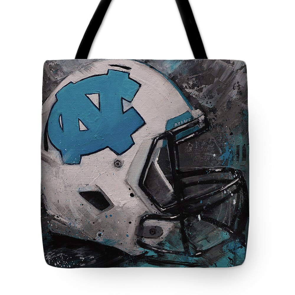 North Carolina Tarheels Tote Bag featuring the painting I bleed Carolina Blue Tarheel Wall Art Football Helment by Gray Artus