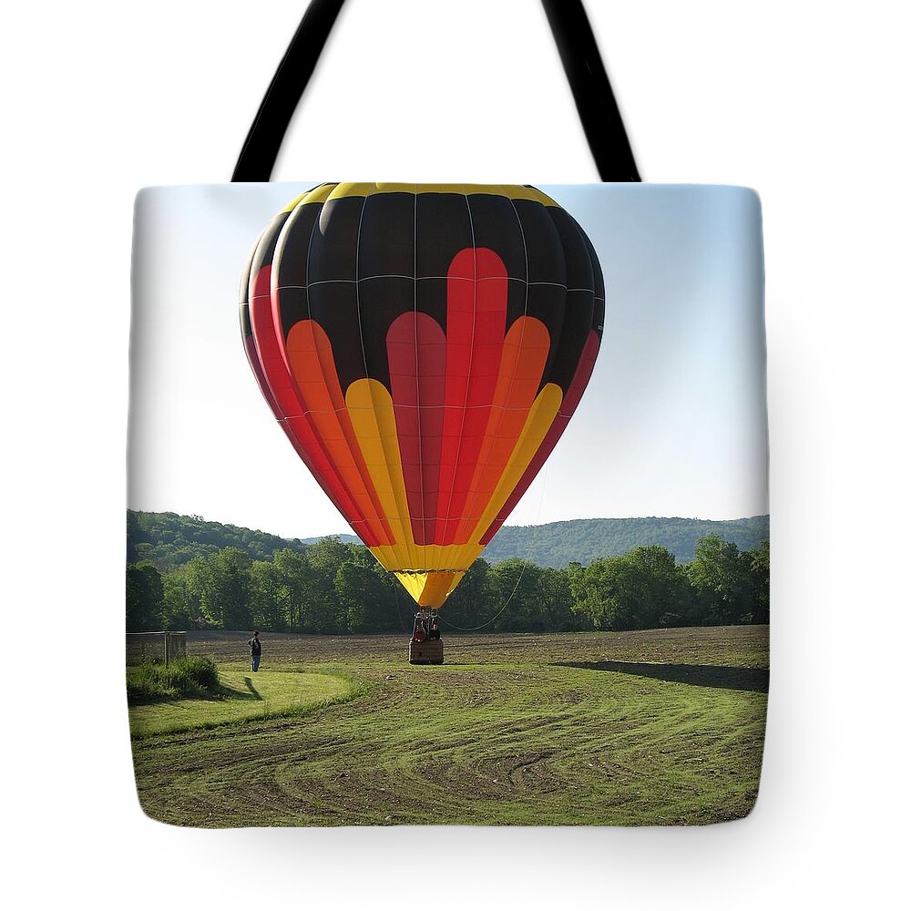 Hot Air Balloons Tote Bag featuring the photograph I just planted this field by Ed Smith