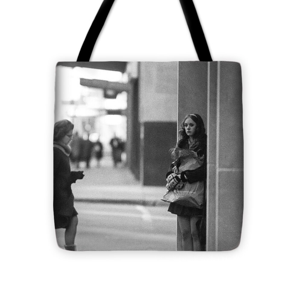 Actions Tote Bag featuring the photograph I should have dressed warmer by Mike Evangelist