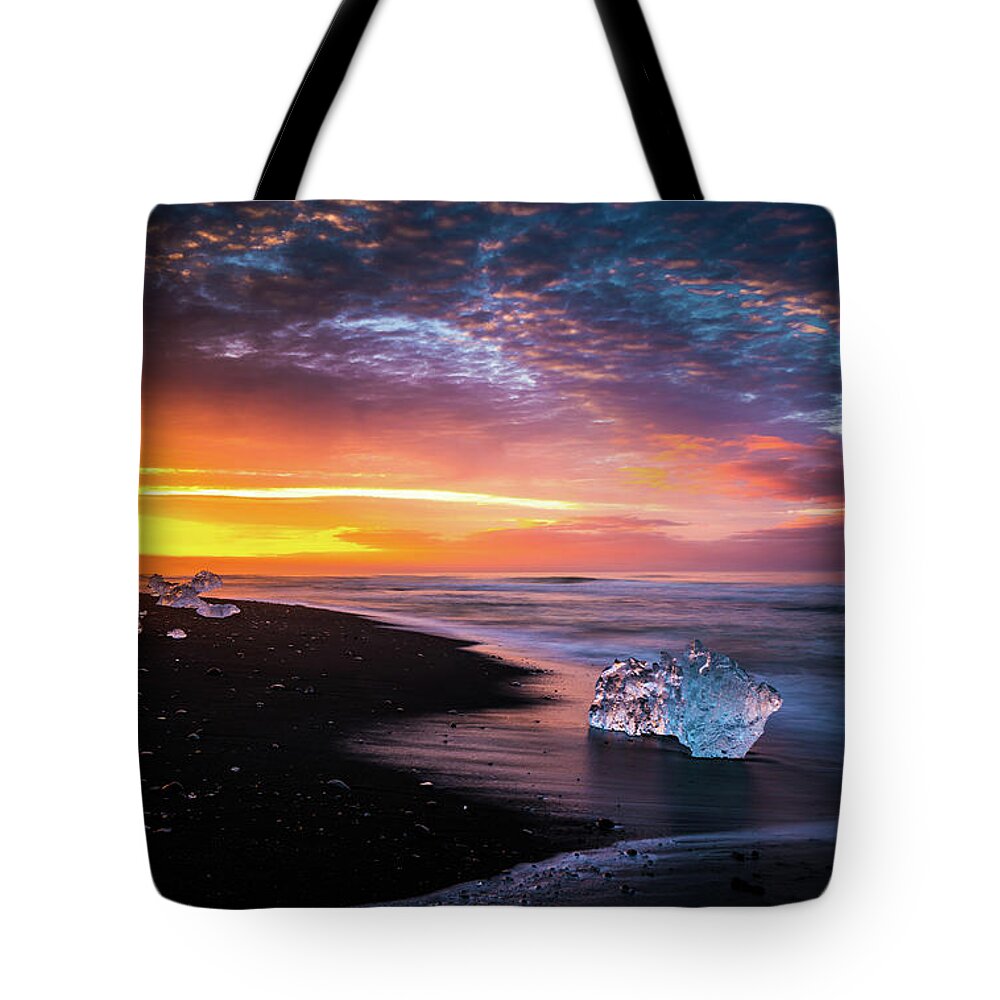 Jokulsarlon Tote Bag featuring the photograph Iceland Glacial Ice Sunrise by Mike Reid