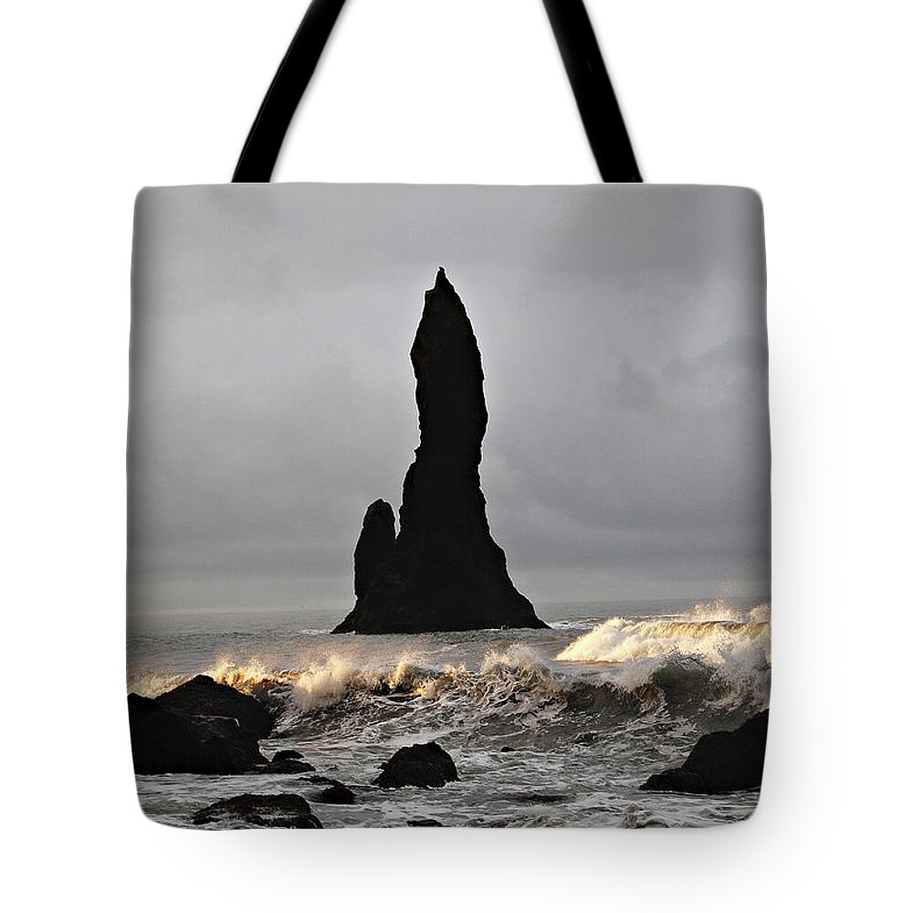 Beach Tote Bag featuring the photograph Icelandic Monolith by Matt Cegelis
