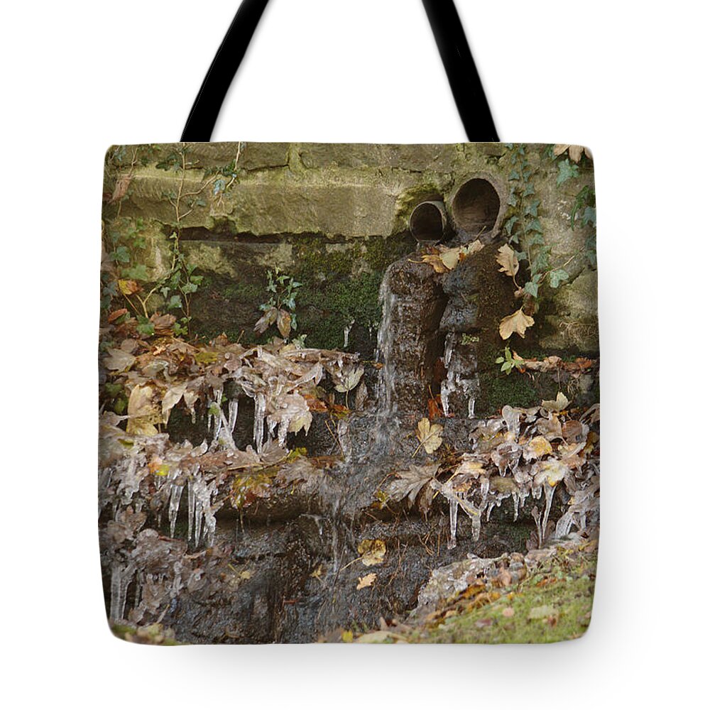 Ice Tote Bag featuring the photograph Icicles At Drain Mouth by Adrian Wale