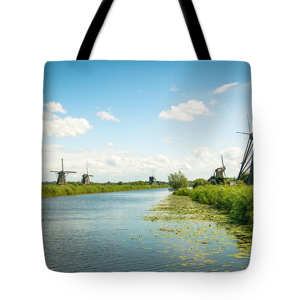Europe Tote Bag featuring the photograph idyllic Kinderdijk by Hannes Cmarits