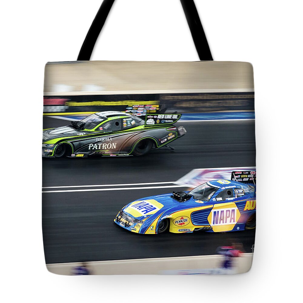Racing Tote Bag featuring the photograph In a blur by Paul Quinn