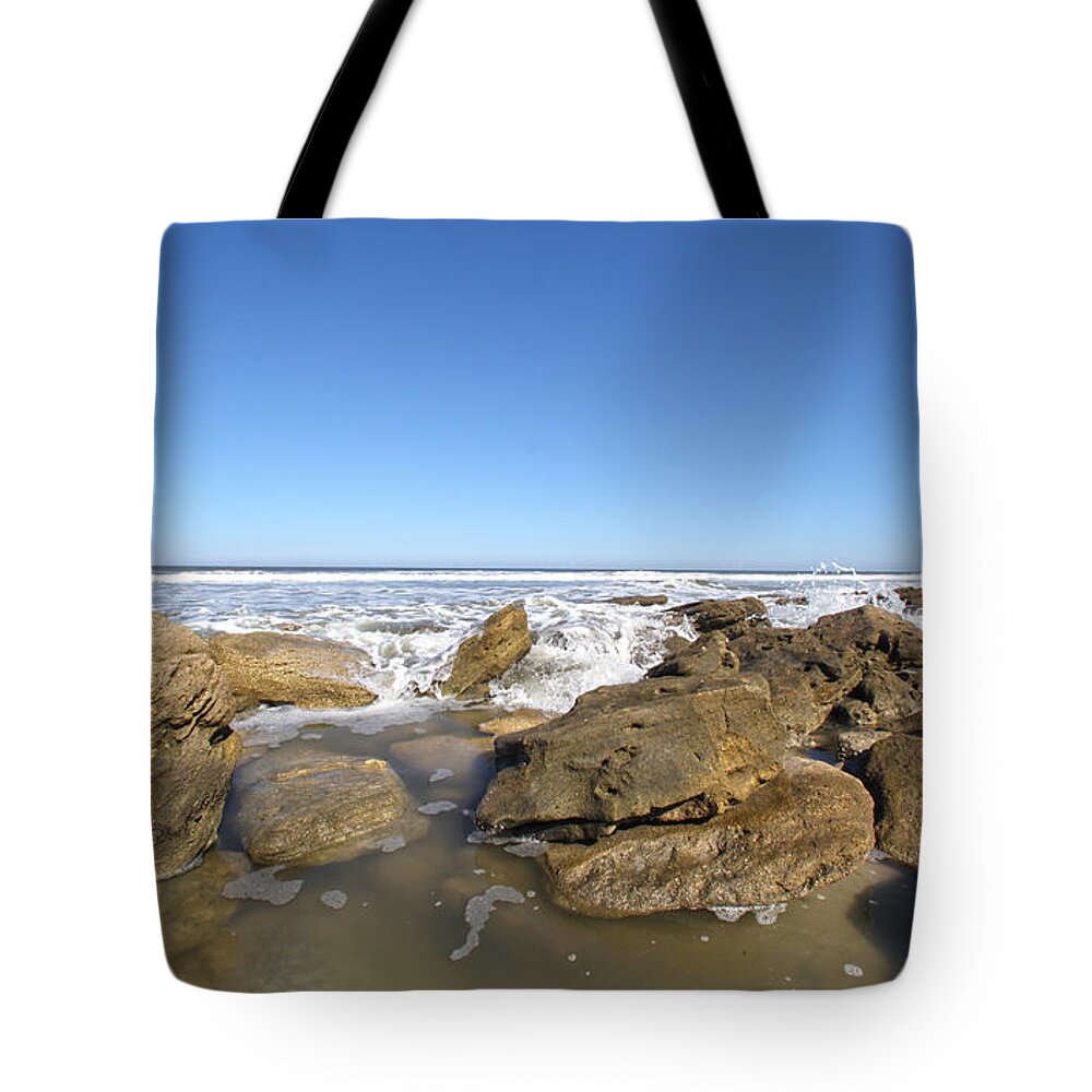 Silhouette Tote Bag featuring the photograph In the Rocks by Robert Och