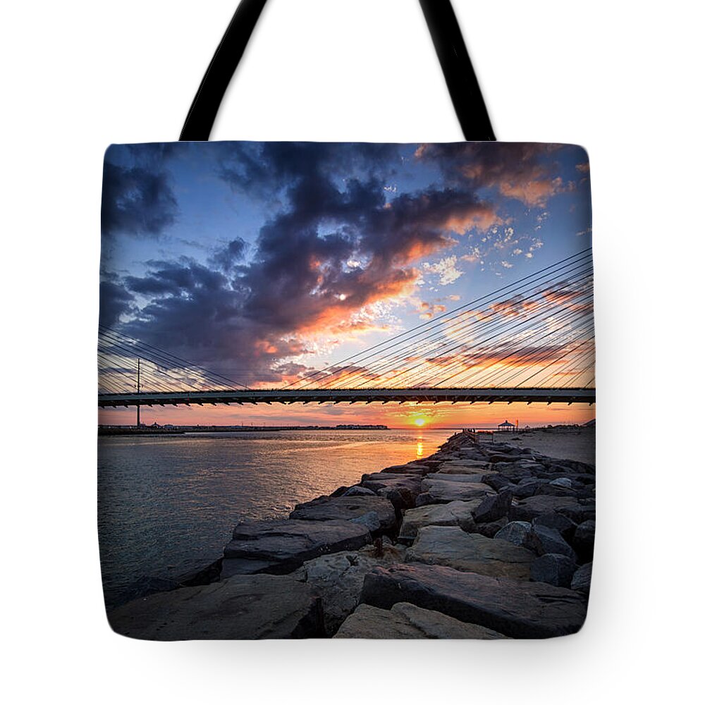 Indian River Bridge Tote Bag featuring the photograph Indian River Inlet and Bay Sunset by Bill Swartwout