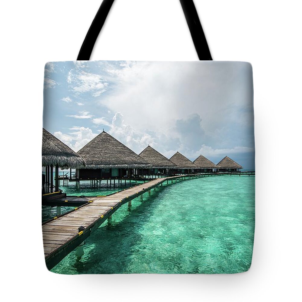 Maldives Tote Bag featuring the photograph Inhale by Hannes Cmarits
