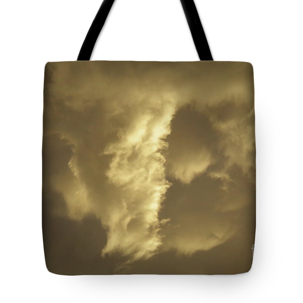 Cloud Tote Bag featuring the photograph Interesting cloud by Tannis Baldwin