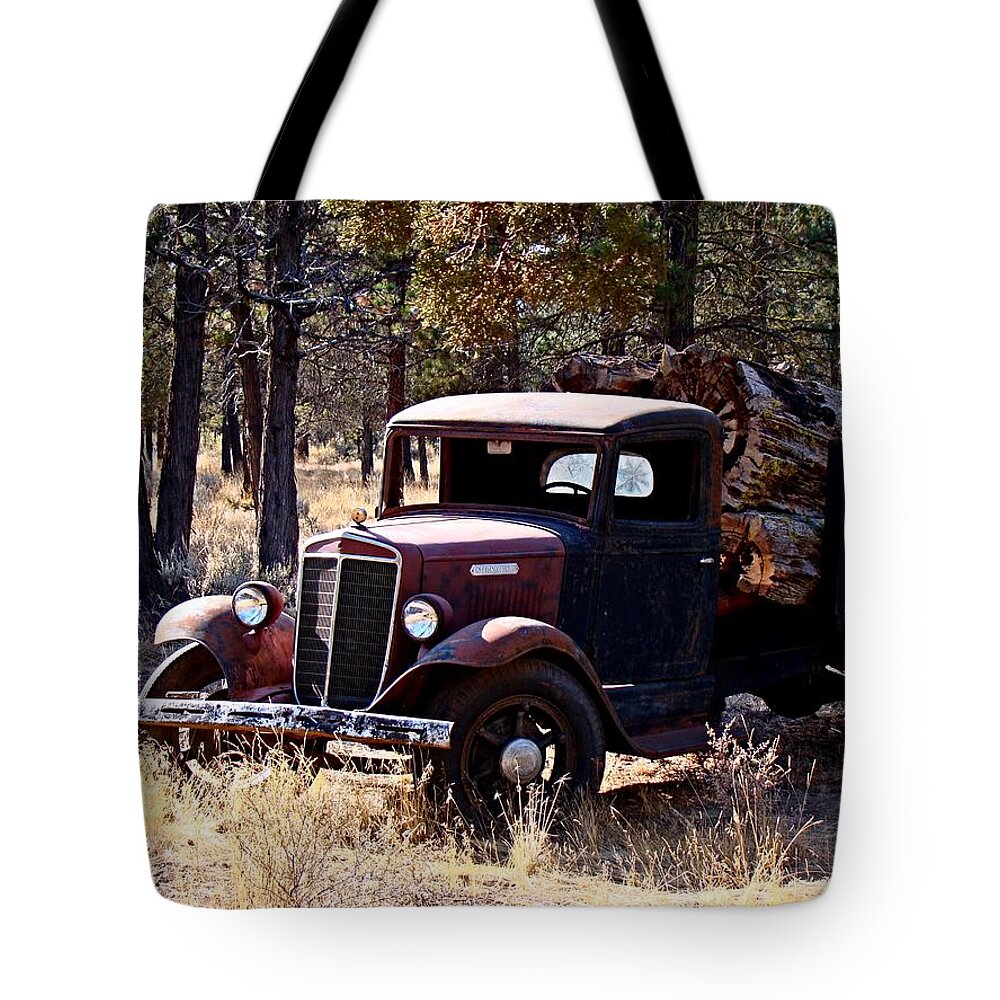Truck Tote Bag featuring the photograph International Log Truck by Nick Kloepping