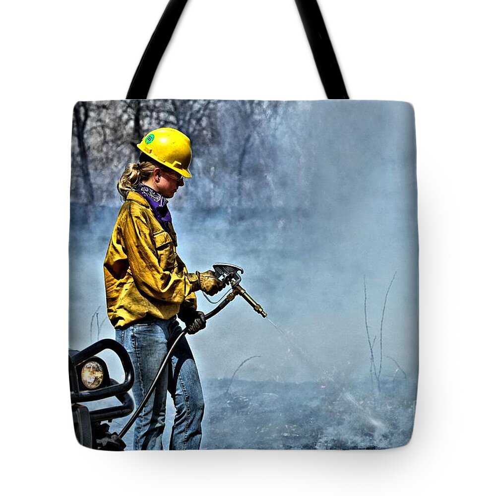 Female Tote Bag featuring the photograph Into The Flames 2 by Jimmy Ostgard