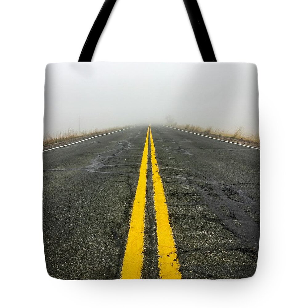 Road Tote Bag featuring the photograph Into the Fog by Rand Ningali