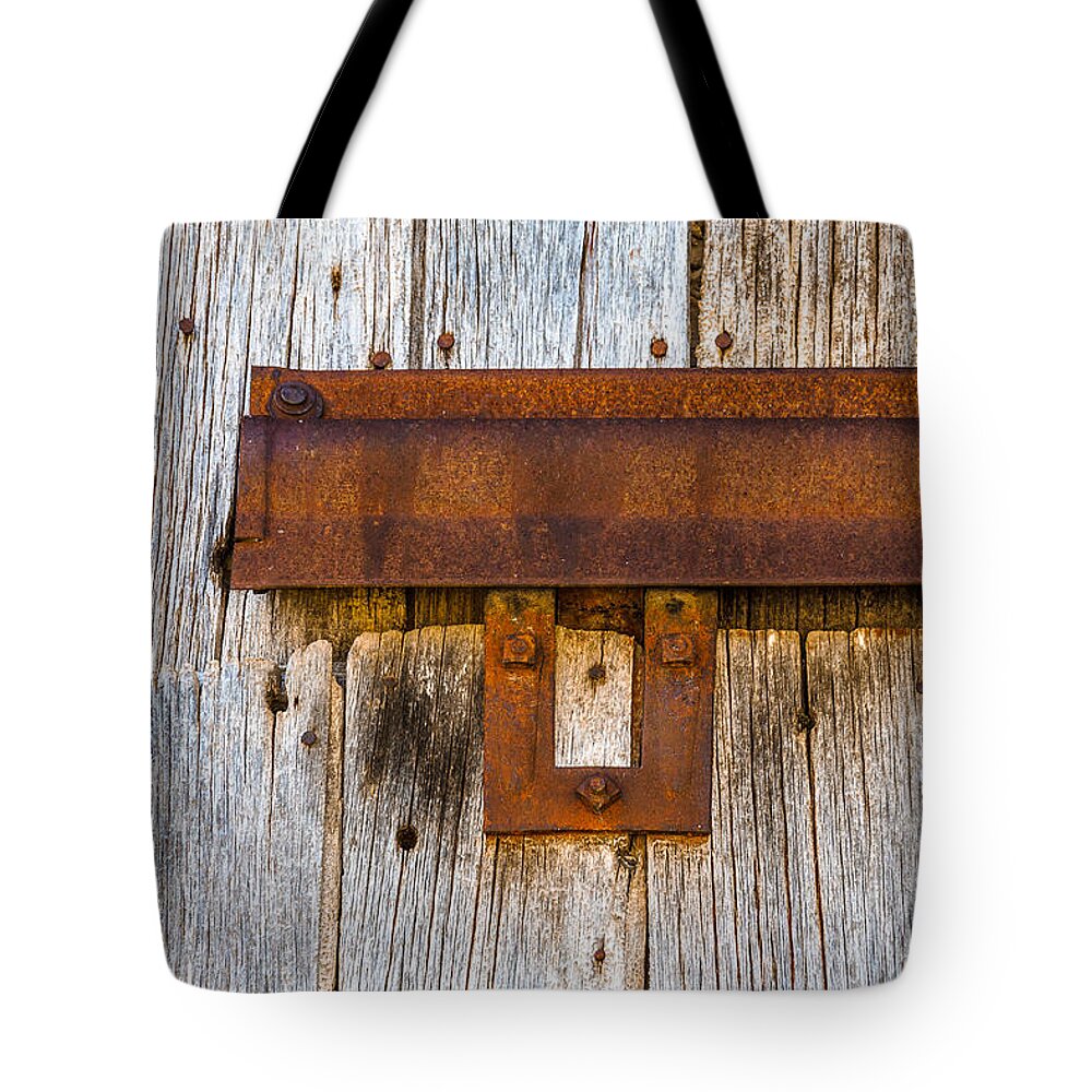 Steven Bateson Tote Bag featuring the photograph Iron And Wood by Steven Bateson