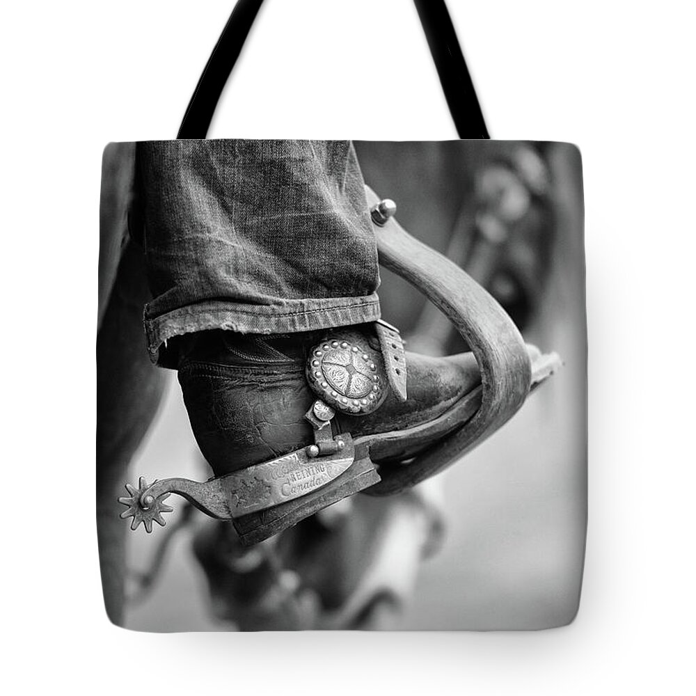 Three Bars Ranch Tote Bag featuring the photograph I've Got Spurs - Three Bars Ranch by Ryan Courson