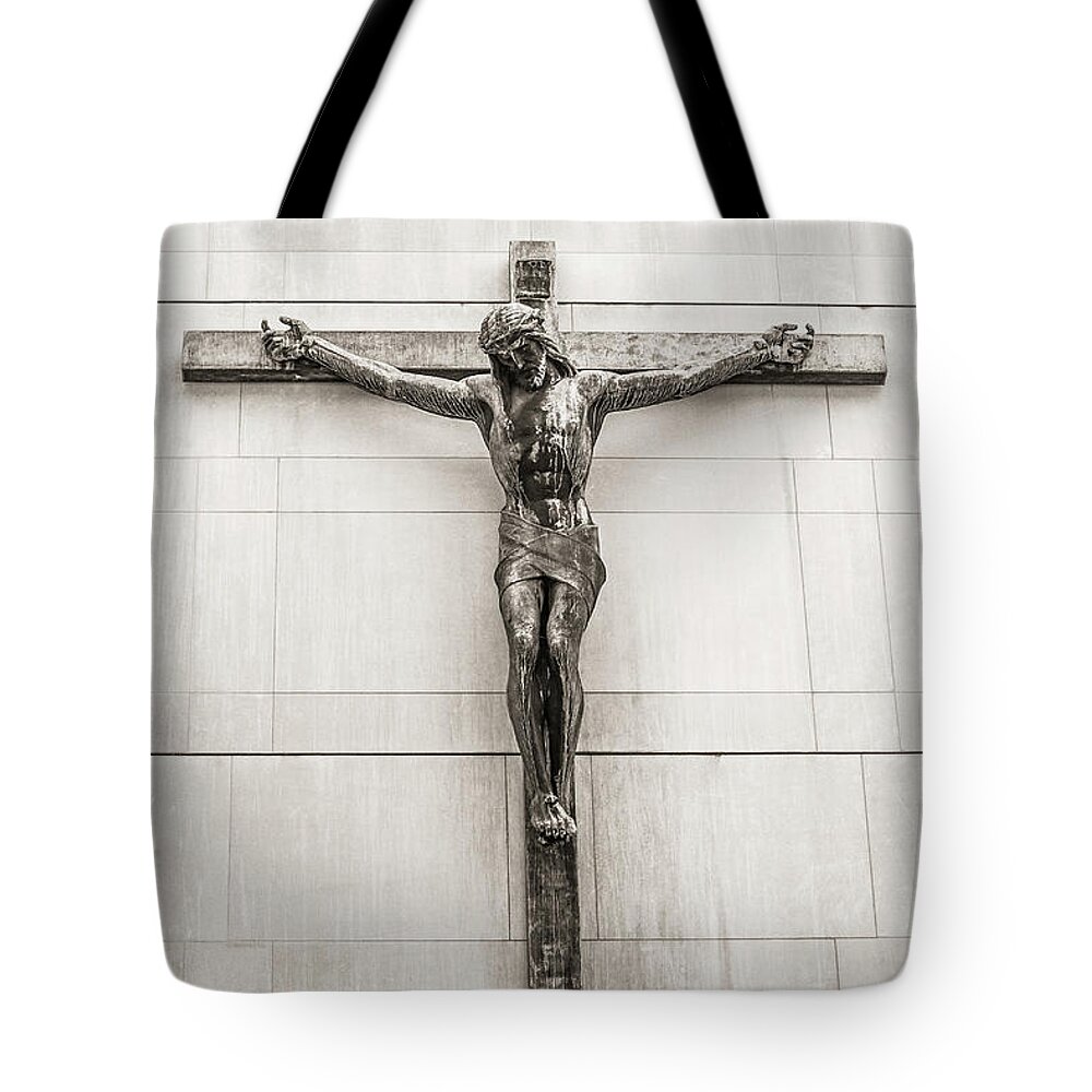 Jesus Tote Bag featuring the photograph Jesus on the cross by Jason Hughes