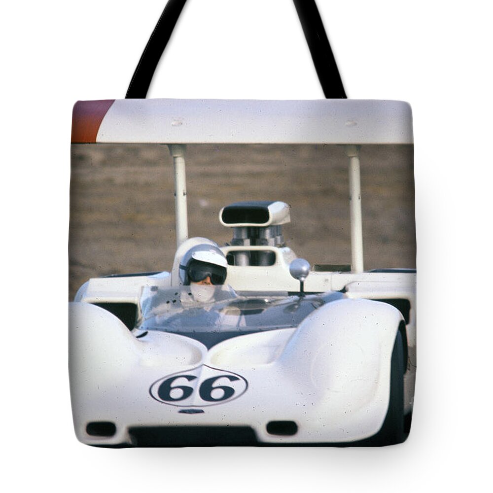 Jim Hall Tote Bag featuring the photograph Jim Hall in the Chaparral Closeup by Dave Allen