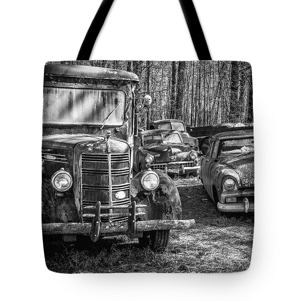 Old Mack Truck Tote Bag featuring the photograph Junked Mack truck ad old Plymouth by Matthew Pace