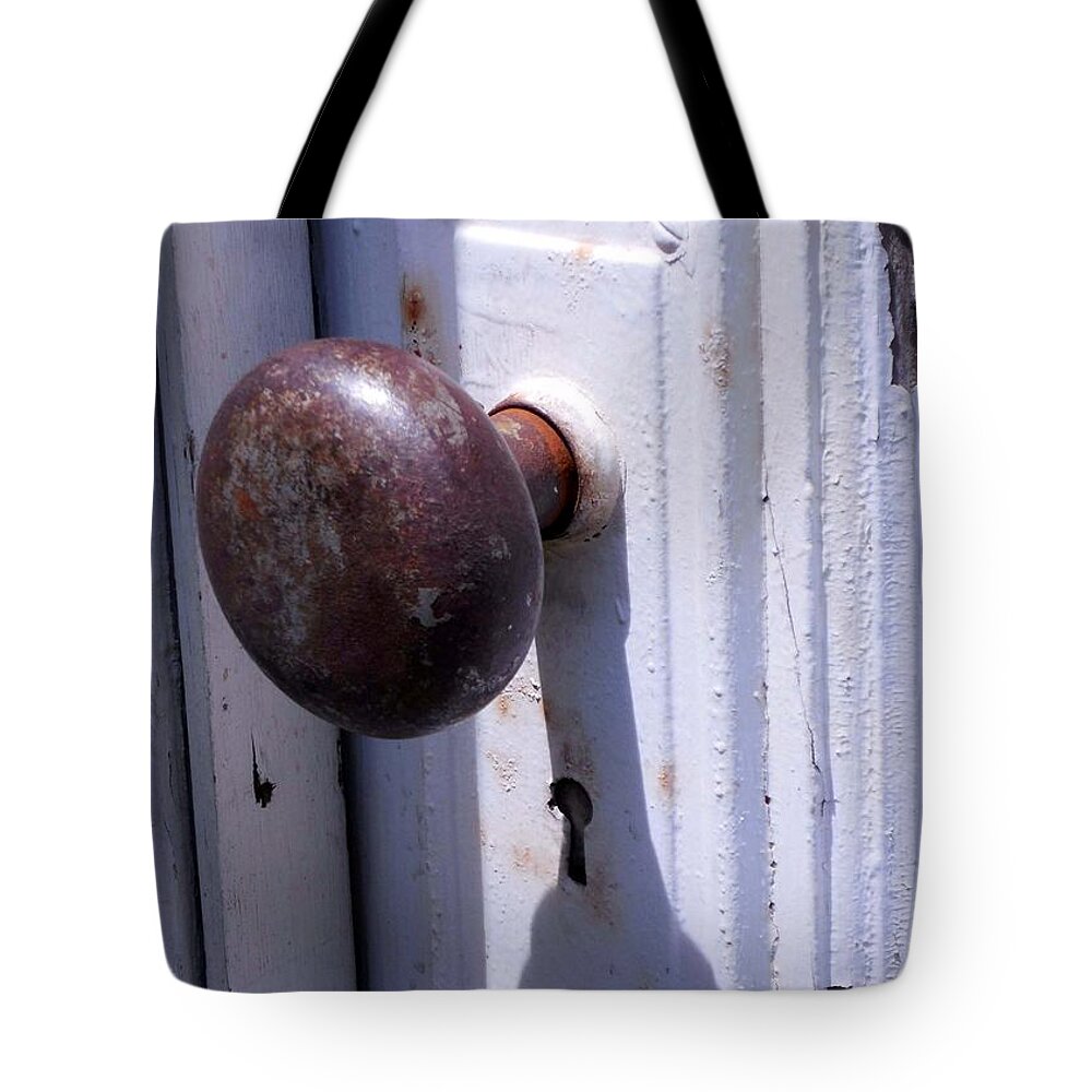 Old Wooden Door With Vintage Hardware. White Door Rusted Knob Tote Bag featuring the photograph Keyhole by Steve Godleski