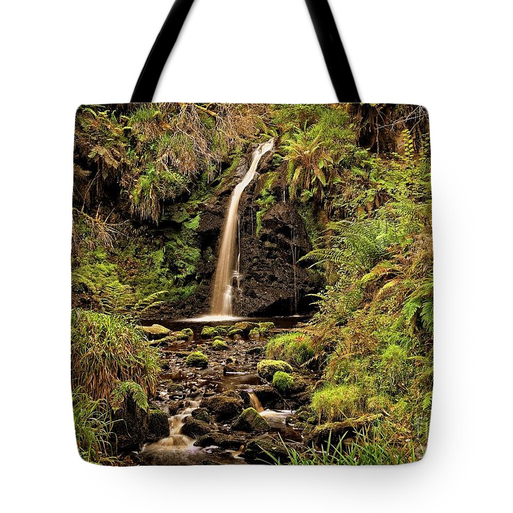 Waterfall Tote Bag featuring the photograph Kielder Forest Waterfall by Martyn Arnold