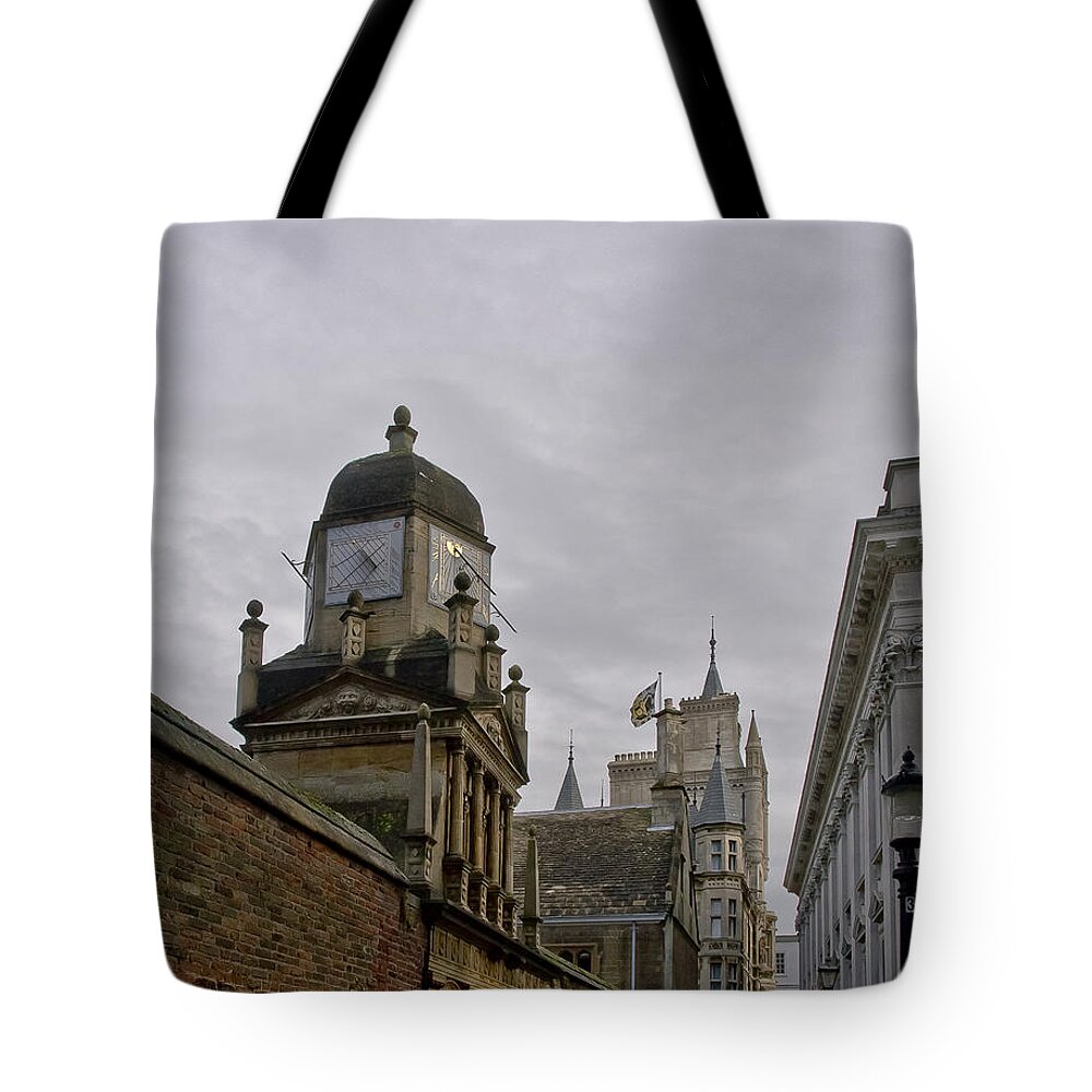 Cambridge Tote Bag featuring the photograph King college sundial clock tower. by Elena Perelman