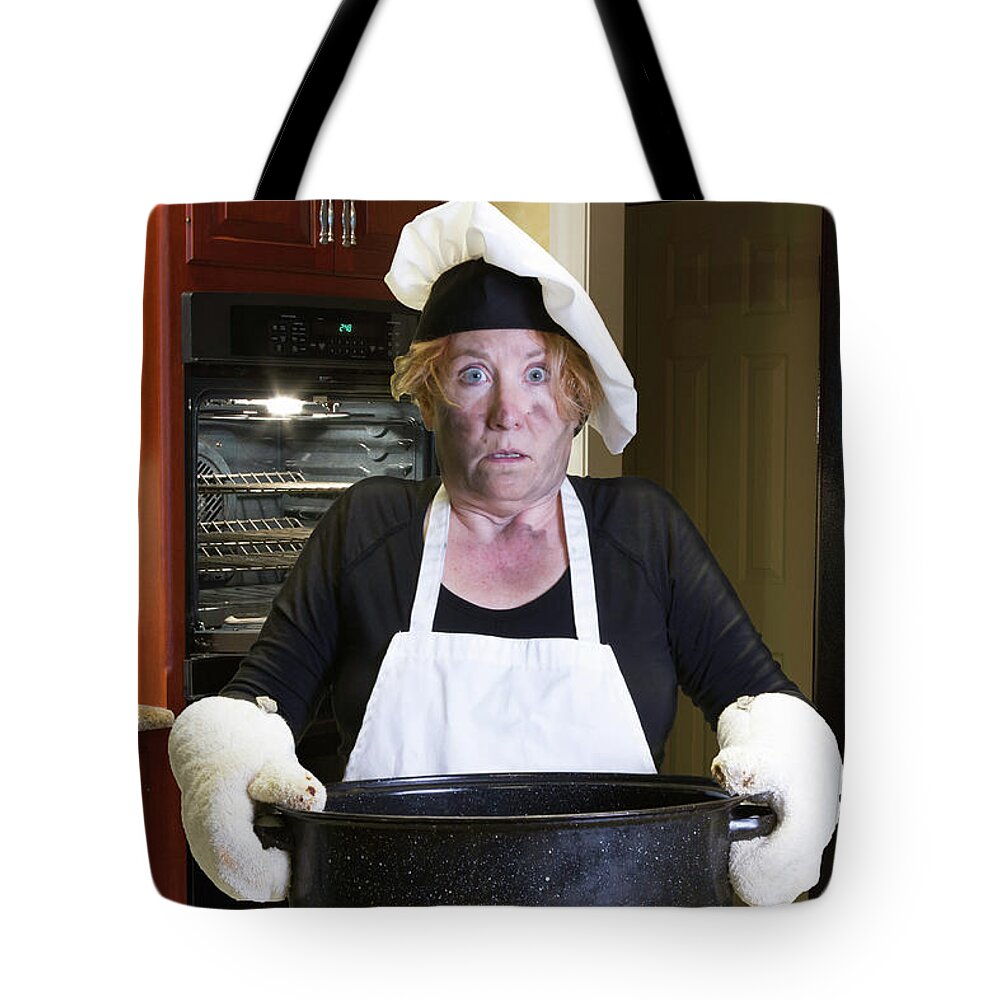 Woman Tote Bag featuring the photograph Kitchen disaster with apron and chef hat by Karen Foley