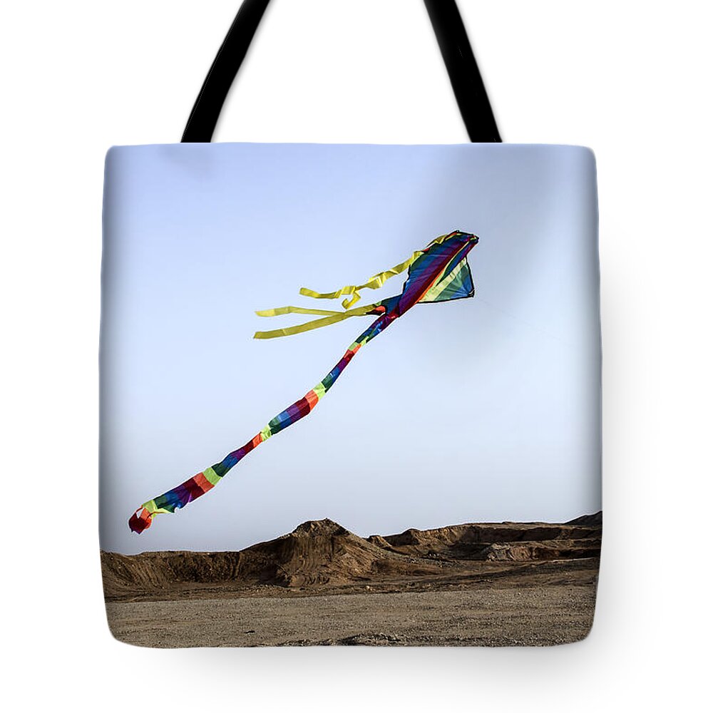 Joy Tote Bag featuring the photograph Kite Dancing In Desert 04 by Arik Baltinester