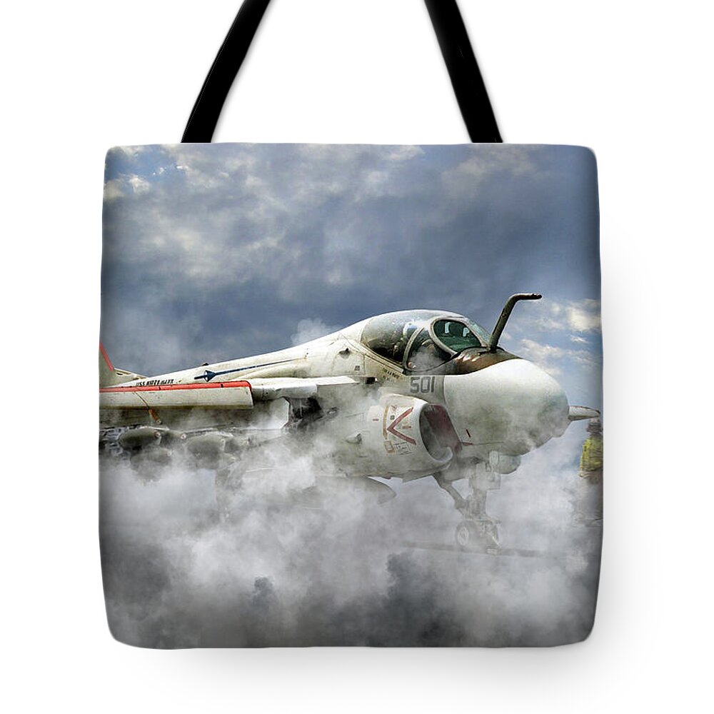 A Grumman A6 Intruder From Va-52 The 'knight Riders Ready For Launch From The Uss Kitty Hawk Tote Bag featuring the digital art Knight Riders by Airpower Art