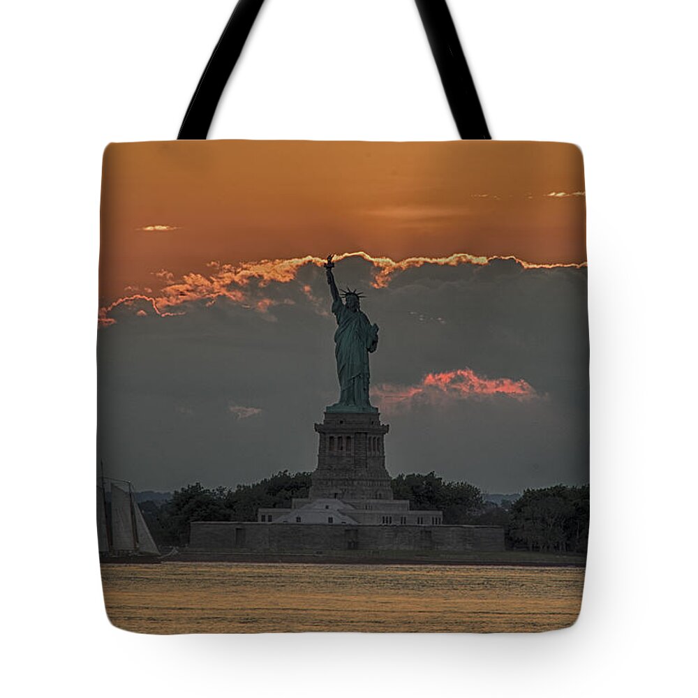 Sunset Tote Bag featuring the photograph Lady at Sunset by Roni Chastain