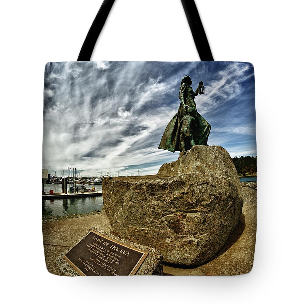 Statue Tote Bag featuring the photograph Lady of the Sea by Tony Locke