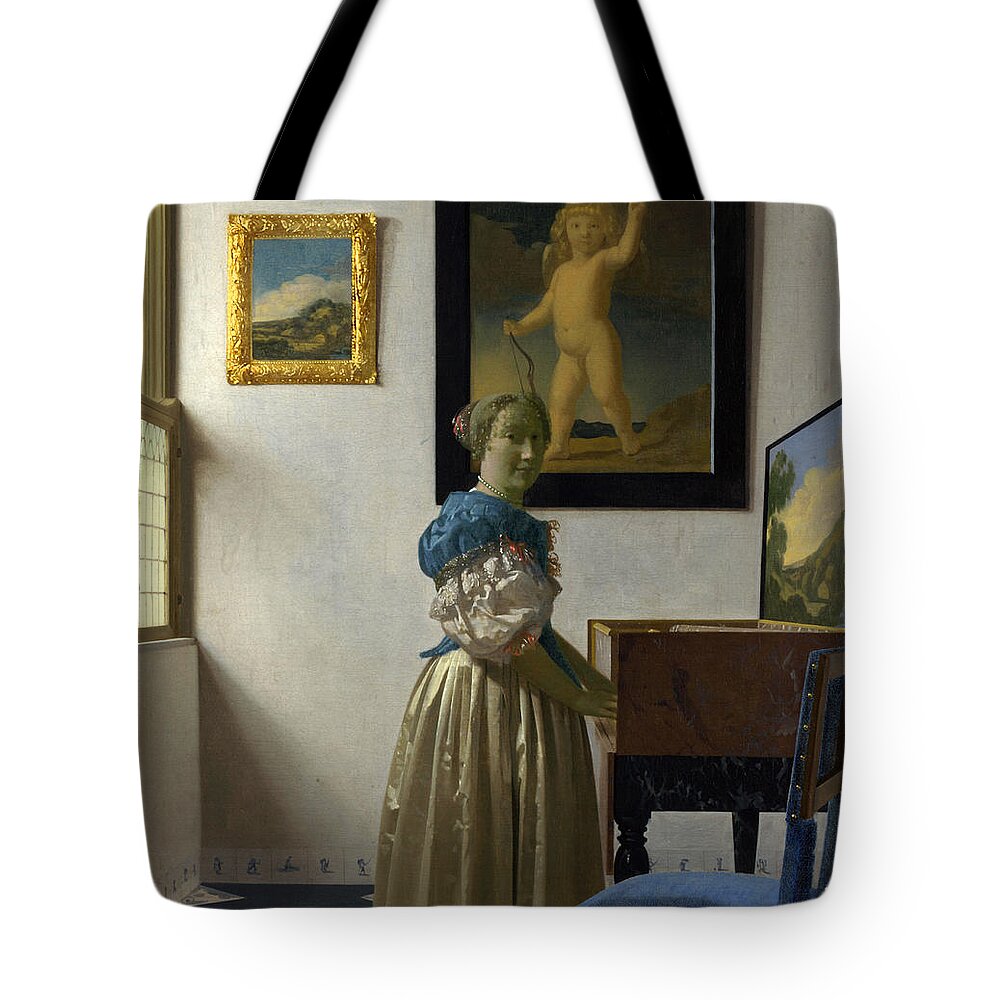 Johannes Vermeer Tote Bag featuring the painting Lady Standing At A Virginal by Johannes Vermeer