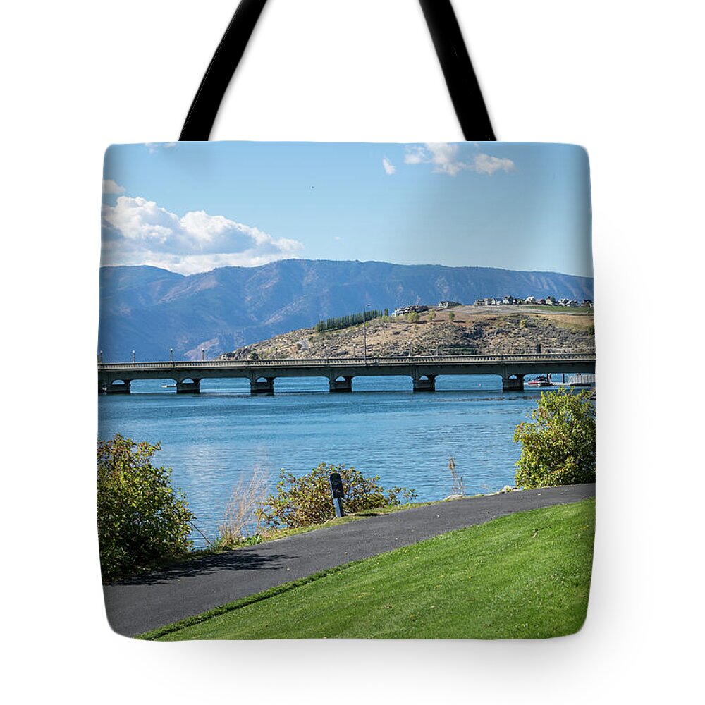 Lake Chelan Dam Tote Bag featuring the photograph Lake Chelan Bridge by Tom Cochran