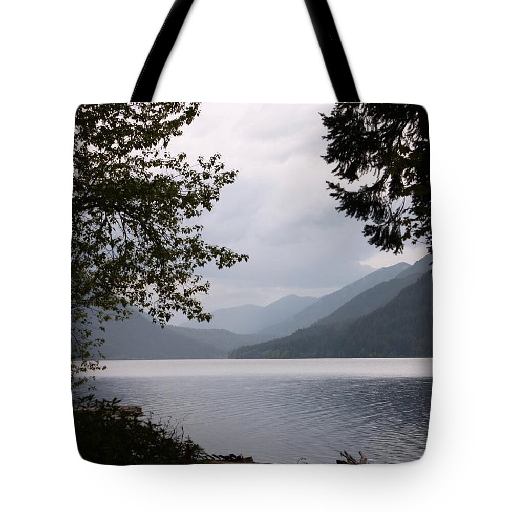 Lake Crescent Tote Bag featuring the photograph Lake Crescent through the Trees by Carol Groenen