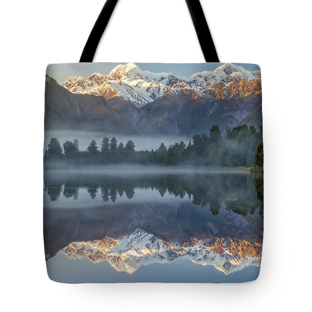 Zealand Tote Bag featuring the photograph Lake Matheson reflection 2 by Martin Capek