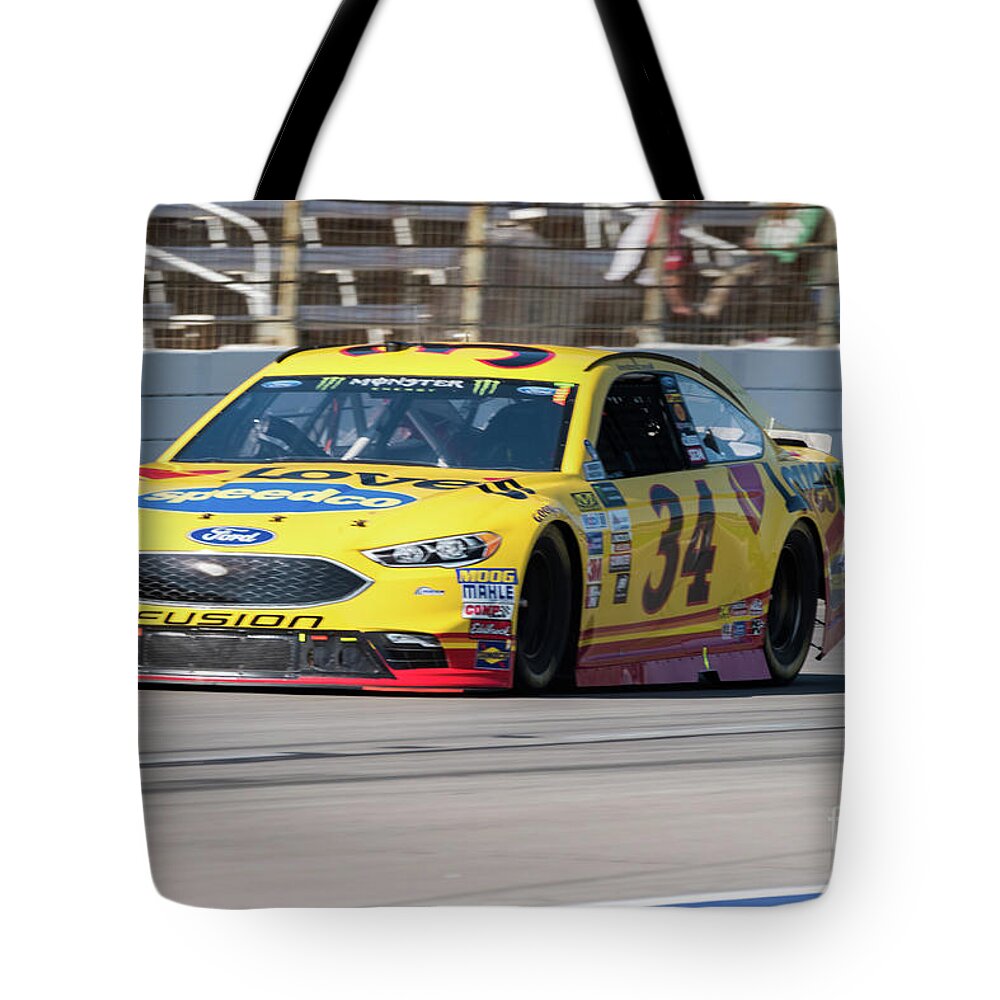  Tote Bag featuring the photograph Landon Cassill running at Texas Motor Speedway by Paul Quinn