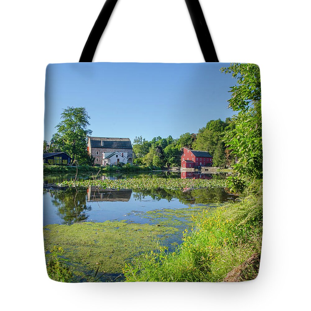 The Tote Bag featuring the photograph Late Summer - The Red Mill on the Raritan River - Clinton New J by Bill Cannon