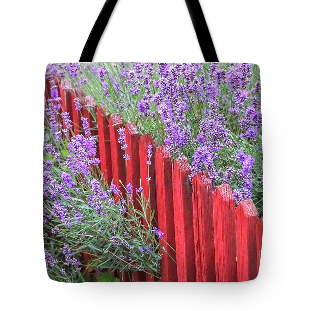 Countryside Tote Bag featuring the photograph Lavender around a red wooden fence by Amanda Mohler