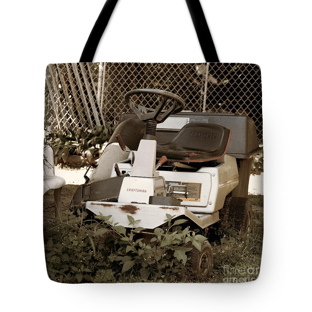 Lawn Tote Bag featuring the photograph Lawn Ornament - Craftsman Riding Lawn Tractor by Jason Freedman