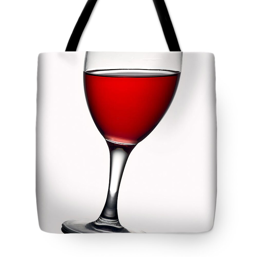 Alcohol Tote Bag featuring the photograph Leaning by Gert Lavsen