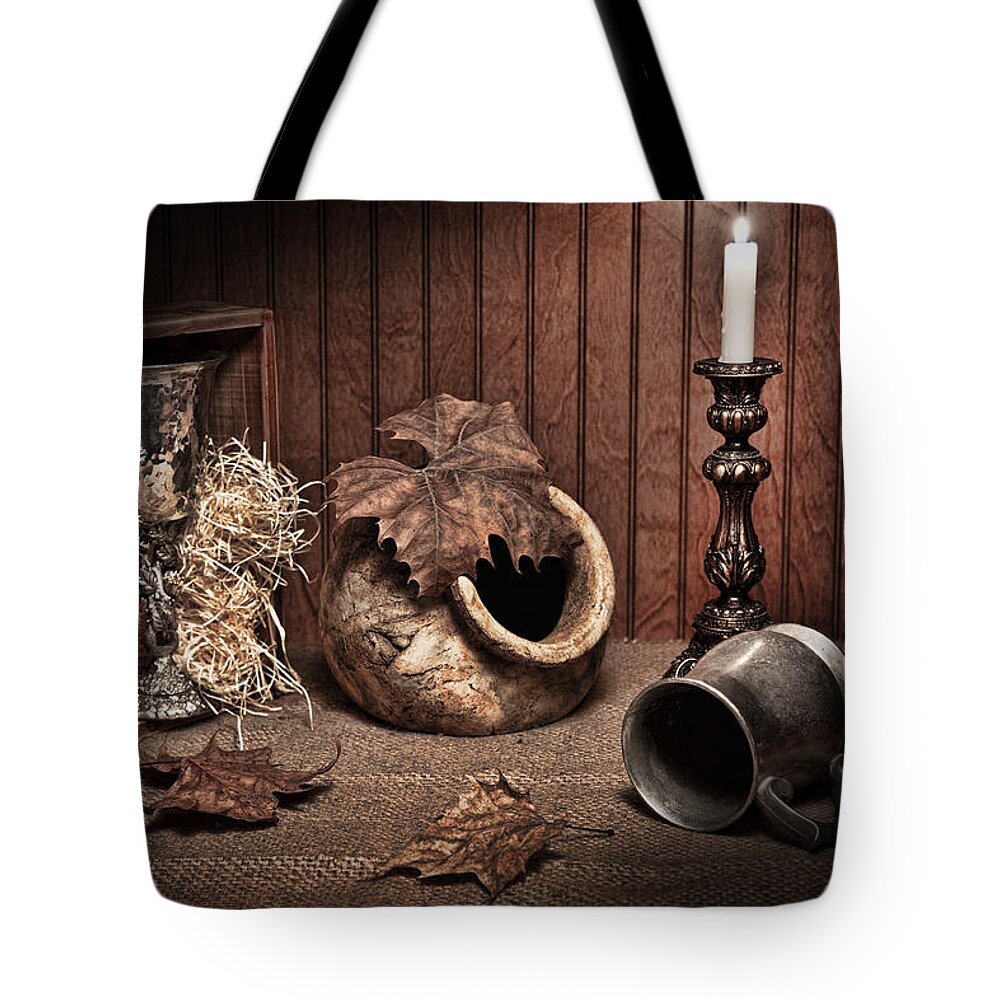 Leaves Tote Bag featuring the photograph Leaves and Vessels by Candlelight by Tom Mc Nemar