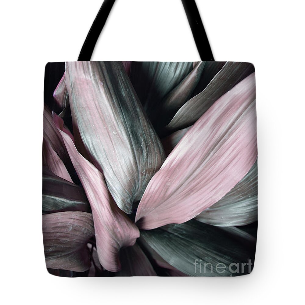 Pink Tote Bag featuring the photograph Leaves in Pink and Blue Shades by PrintsProject