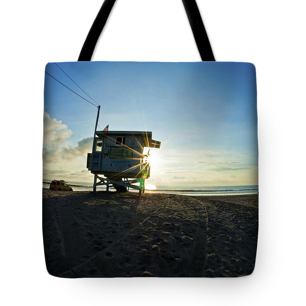 Santa Monica Beach Tote Bag featuring the photograph Lifeguard stand on Santa Monica beach by Micah May