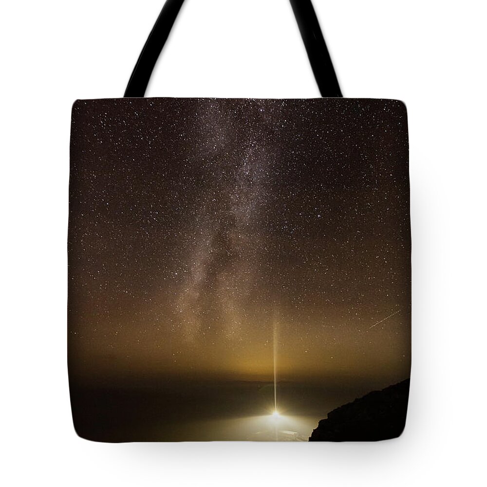 Astrophotography Tote Bag featuring the photograph Lighthouse and Milky Way by B Cash