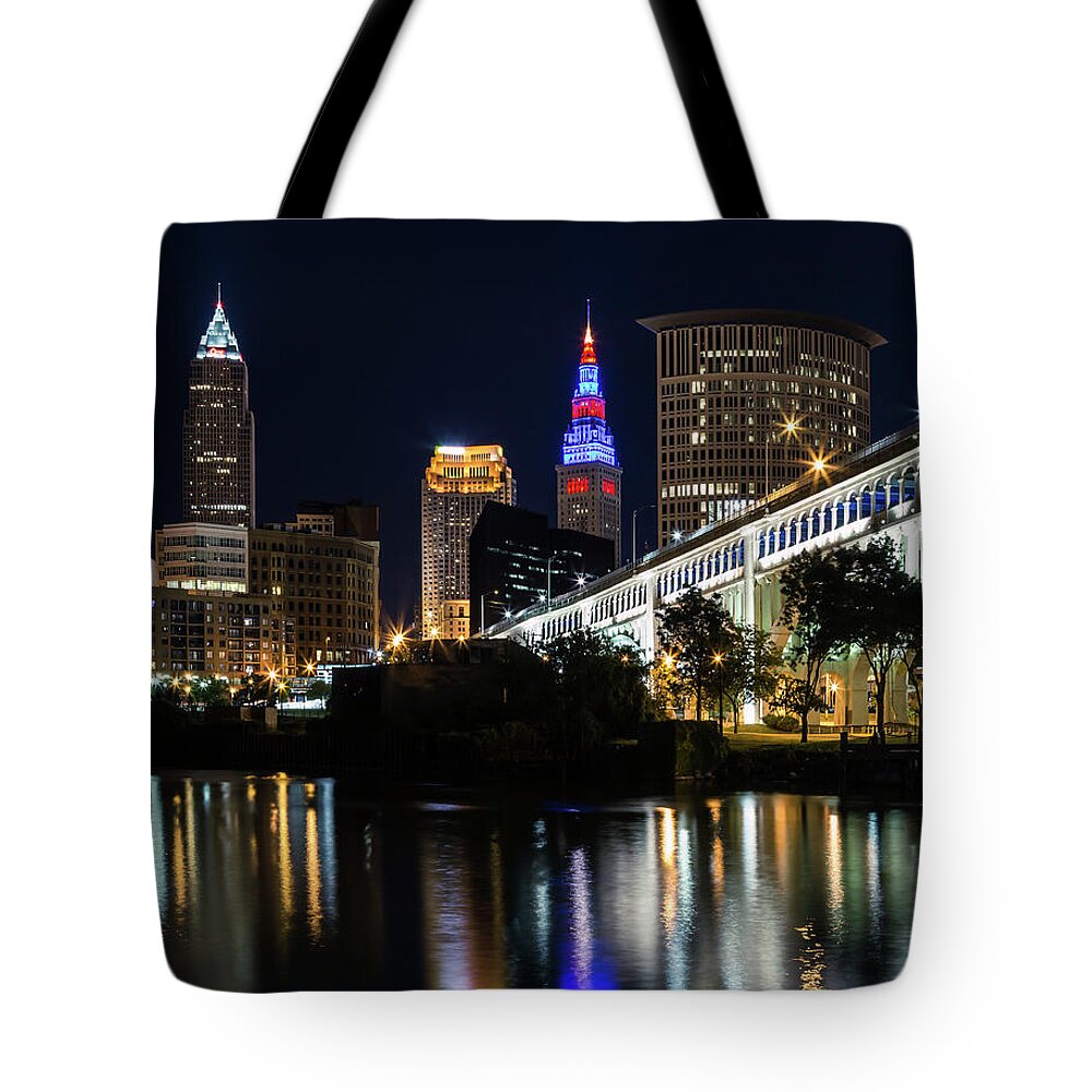 Lighting Up Cleveland Tote Bag featuring the photograph Lighting Up Cleveland by Dale Kincaid