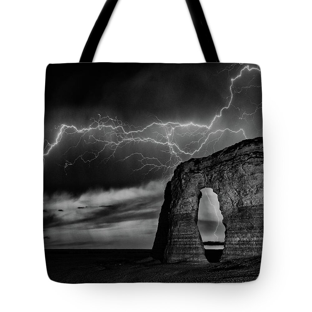Storms Tote Bag featuring the photograph Lightning at Monument Rocks by Darren White