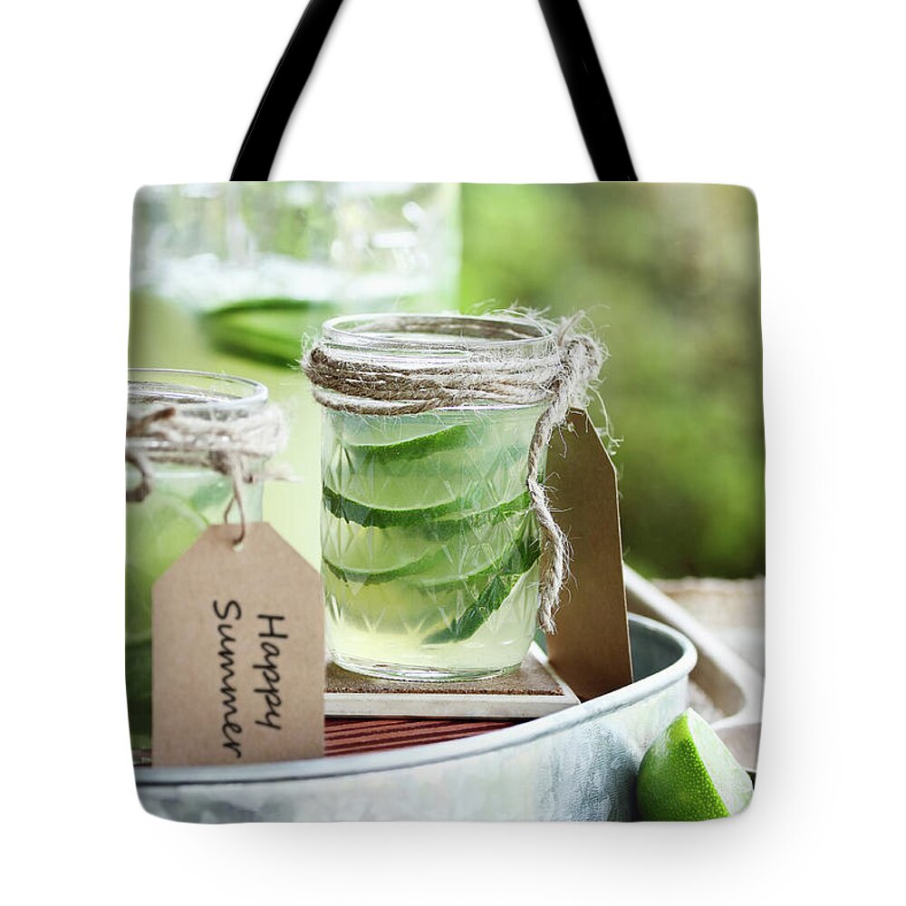 Limeade Tote Bag featuring the photograph Limeade Summers by Stephanie Frey