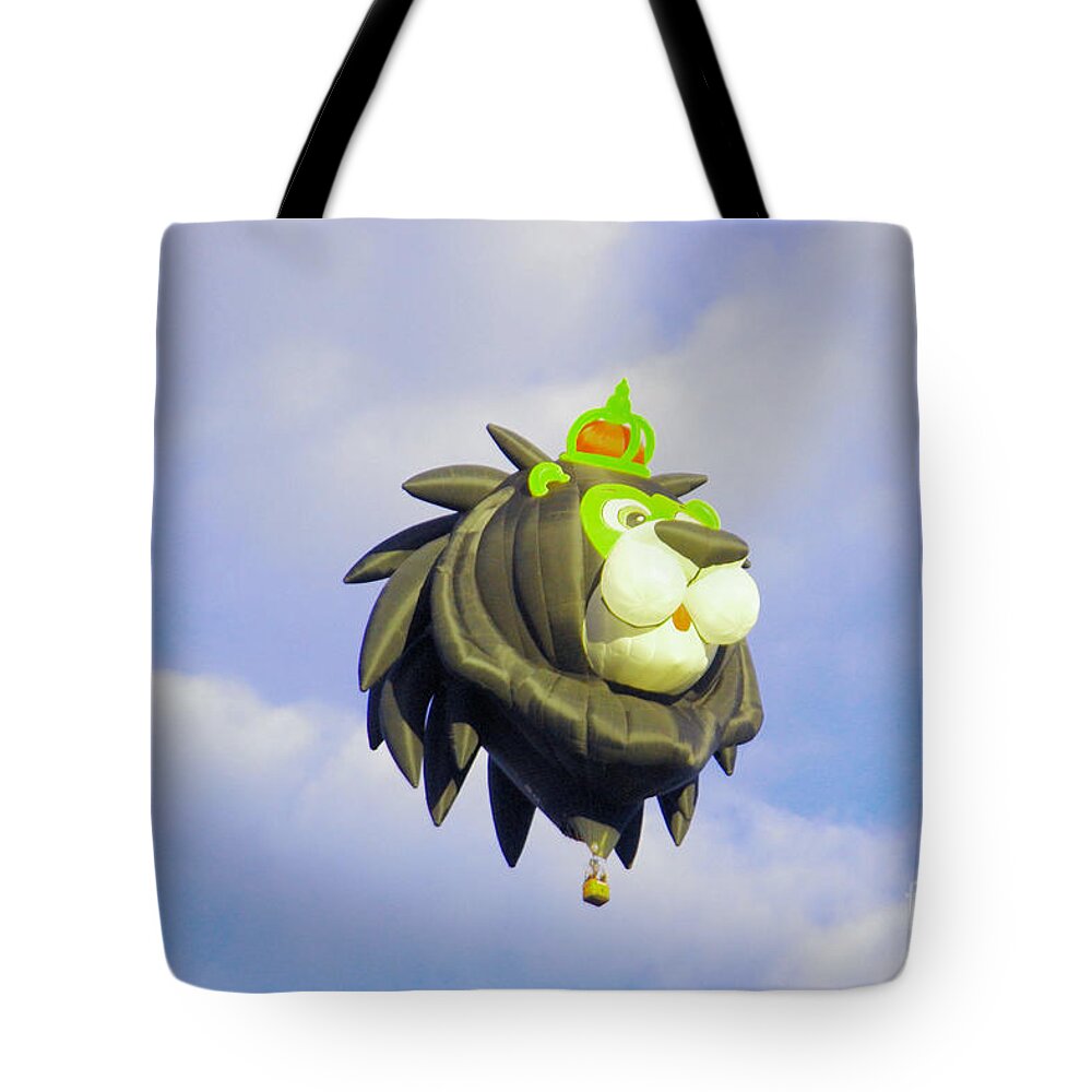  Balloon Tote Bag featuring the photograph Lion King balloon by Jeff Swan