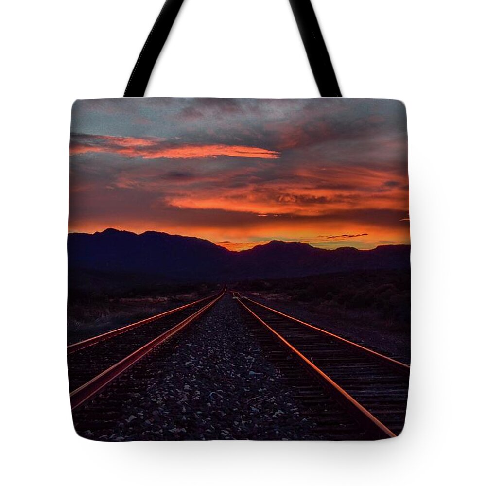 Sunset Tote Bag featuring the photograph Liquid copper flowing into the night by Gaelyn Olmsted