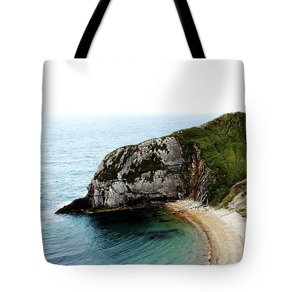 Cove Beach Sea Sand Jurassic Coast Cliffs Waves World Heritage Site English Channel Rocks Misty Tote Bag featuring the photograph Lonely Cove by Jeff Townsend